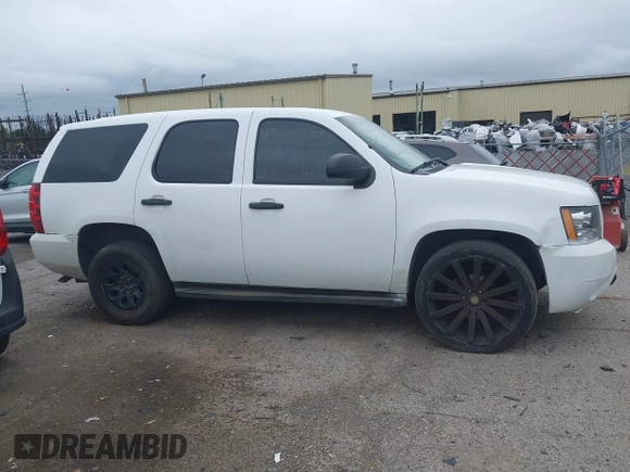 2012 Chevrolet Tahoe Commercial with VIN 1GNLC2E02CR322901, listed as a IAAI auction lot 42679887 with 251,794 mi miles and . Bid and sale history available at DreamBid. Image 14.