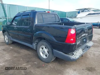 2003 Ford Explorer Sport Trac XLS z VIN 1FMZU77EX3UB99153, wystawiony jako IAAI lot #42029196 z przebiegiem Nie podano mil oraz . Historia ofert i sprzedaży dostępna na DreamBid. Obrazek 3.