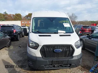 2023 Ford Transit Cargo with VIN 1FTBR1C86PKA52494, listed as a IAAI auction lot 40740671 with 9,999 mi miles and . Bid and sale history available at DreamBid. Image 12.