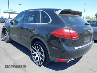2014 Porsche Cayenne with VIN WP1AA2A23ELA09728, listed as a IAAI auction lot 42289887 with 153,533 mi miles and . Bid and sale history available at DreamBid. Image 3.