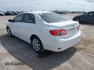 2013 Toyota Corolla L with VIN 5YFBU4EE1DP090957, listed as a IAAI auction lot 41898057 with 127,438 mi miles and . Bid and sale history available at DreamBid. Image 3.