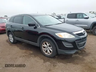 2011 Mazda CX-9 Touring z VIN JM3TB2CV2B0329979, wystawiony jako IAAI lot #42426160 z przebiegiem 171 585 mil mil oraz . Historia ofert i sprzedaży dostępna na DreamBid. Obrazek 1.