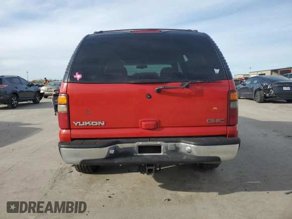 2000 GMC Yukon SLT with VIN 1GKEC13T3YJ141423, listed as a Copart auction lot 82344364 with 224,313 mi miles and Salvage Title. Bid and sale history available at carsss.com. Image 6.
