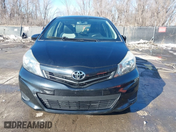 2012 Toyota Yaris L with VIN JTDKTUD31CD500337, listed as a IAAI auction lot 41410723 with 130,881 mi miles. Bid and sale history available at carsss.com. Image 12.