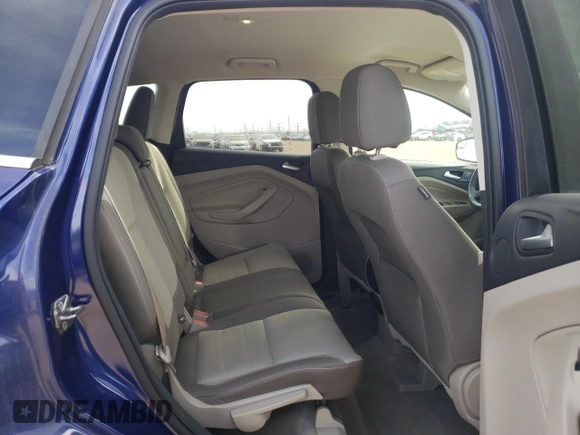 2016 Ford Escape SE z VIN 1FMCU0G99GUC07099, wystawiony jako Copart lot #54575115 z przebiegiem 86 623 mil mil oraz Szkoda całkowita • Salvage title. Historia ofert i sprzedaży dostępna na DreamBid. Obrazek 10.