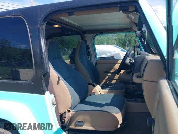 2002 Jeep Wrangler Sahara с VIN 1J4FA59S62P768112, выставлен на аукционе IAAI как лот 42657738 с пробегом 196 571 миль миль и . История ставок и продаж доступна на DreamBid. Изображение 5.