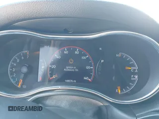 2014 Jeep Grand Cherokee Limited with VIN 1C4RJEBG6EC453833, listed as a IAAI auction lot 41901390 with 148,576 mi miles and . Bid and sale history available at DreamBid. Image 7.