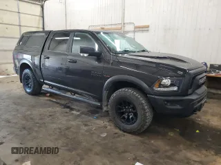 2018 Ram 1500 Rebel with VIN 1C6RR7YT3JS128802, listed as a Copart auction lot 50512365 with 98,106 mi miles and Salvage title. Bid and sale history available at DreamBid. Image 4.