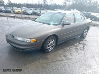2000 Oldsmobile Intrigue GLS with VIN 1G3WX52H9YF131166, listed as a IAAI auction lot 41527895 with 104,534 mi miles. Bid and sale history available at carsss.com. Image 2.