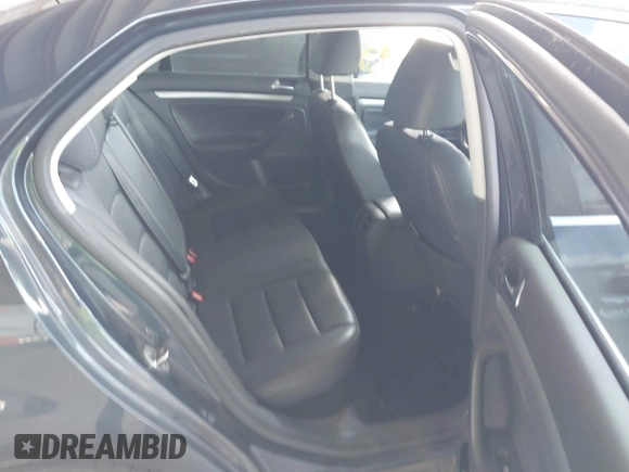 2009 Volkswagen Jetta SE with VIN 3VWRZ71K69M145816, listed as a IAAI auction lot 42607382 with 207,419 mi miles and . Bid and sale history available at DreamBid. Image 8.