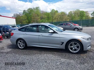 2014 BMW 3 Series 328i Gran Turismo xDrive z VIN WBA3X5C51ED556554, wystawiony jako IAAI lot #42149391 z przebiegiem 189 624 mil mil oraz . Historia ofert i sprzedaży dostępna na DreamBid. Obrazek 13.