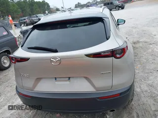 2024 Mazda CX-30 S Premium with VIN 3MVDMBDM1RM647840, listed as a IAAI auction lot 41724670 with 14,796 mi miles and . Bid and sale history available at DreamBid. Image 16.