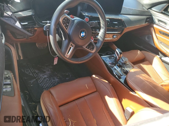 2023 BMW M5 with VIN WBS83CH02PCM33496, listed as a Copart auction lot 85286394 with 0 mi miles and Salvage Title. Bid and sale history available at carsss.com. Image 8.