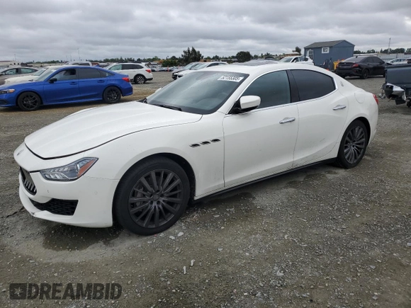 2018 Maserati Ghibli z VIN ZAM57XSA9J1271727, wystawiony jako Copart lot #52155305 z przebiegiem 62 081 mil mil oraz Szkoda całkowita • Salvage title. Historia ofert i sprzedaży dostępna na DreamBid. Obrazek 1.