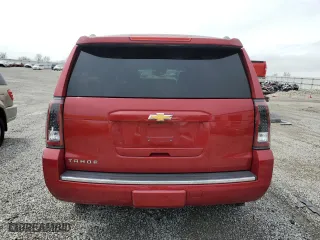 2015 Chevrolet Tahoe LTZ with VIN 1GNSKCKCXFR723104, listed as a Copart auction lot 50660325 with 198,740 mi miles and Salvage Title. Bid and sale history available at carsss.com. Image 6.