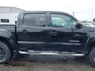2014 Toyota Tacoma with VIN 5TFLU4EN5EX101434, listed as a IAAI auction lot 42273927 with 216,394 mi miles and . Bid and sale history available at DreamBid. Image 13.