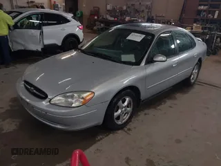 2003 Ford Taurus SES Standard with VIN 1FAFP55U13G222465, listed as a IAAI auction lot 42168336 with 128,078 mi miles. Bid and sale history available at carsss.com. Image 2.