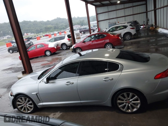 2014 Jaguar XF V6 SC with VIN SAJWJ0EF9E8U17227, listed as a IAAI auction lot 40455665 with 125,196 mi miles. Bid and sale history available at carsss.com. Image 14.