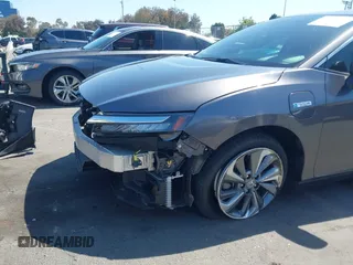 2018 Honda Clarity Touring z VIN JHMZC5F32JC024117, wystawiony jako IAAI lot #42312916 z przebiegiem 27 122 mil mil oraz . Historia ofert i sprzedaży dostępna na DreamBid. Obrazek 6.
