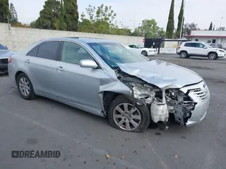 2007 Toyota Camry LE with VIN 4T1BK46K67U542687, listed as a IAAI auction lot 42182009 with 121,136 mi miles and . Bid and sale history available at DreamBid. Image 1.