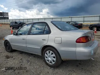 2001 Toyota Corolla CE с VIN 1NXBR12E41Z522052, выставлен на аукционе Copart как лот 64557815 с пробегом 199 660 миль миль и Списание • Salvage title. История ставок и продаж доступна на DreamBid. Изображение 2.