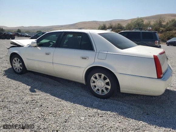 2011 Cadillac DTS with VIN 1G6KA5E68BU102452, listed as a Copart auction lot 70063094 with 66,589 mi miles and Salvage Title. Bid and sale history available at carsss.com. Image 2.