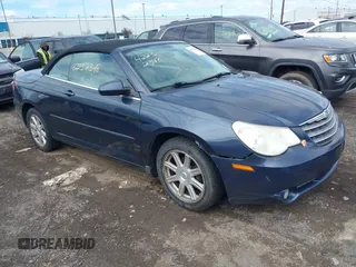 2008 Chrysler Sebring Touring with VIN 1C3LC55R48N147112, listed as a IAAI auction lot 42232348 with 127,092 mi miles and . Bid and sale history available at DreamBid. Image 1.