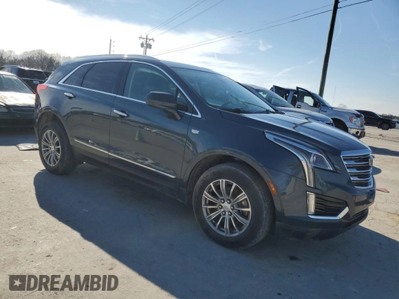2019 Cadillac XT5 Luxury FWD with VIN 1GYKNCRS2KZ243074, listed as a Copart auction lot 44820955 with 49,299 mi miles and Salvage Title. Bid and sale history available at DreamBid. Image 4.