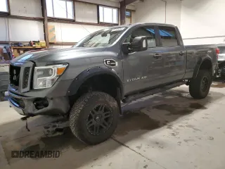 2016 Nissan Titan XD Platinum Reserve with VIN 1N6BA1F44GN503112, listed as a Copart auction lot 81138394 with 143,321 mi miles and Salvage Title. Bid and sale history available at carsss.com. Image 1.