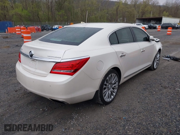 2014 Buick LaCrosse Premium II with VIN 1G4GF5G31EF234190, listed as a IAAI auction lot 42017022 with 125,376 mi miles. Bid and sale history available at carsss.com. Image 4.