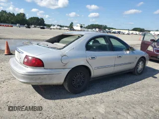 2003 Mercury Sable LS with VIN 1MEHM55S73A619013, listed as a Copart auction lot 73504154 with 200,135 mi miles and Salvage Title. Bid and sale history available at DreamBid. Image 3.