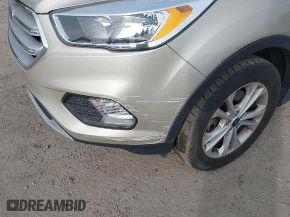 2018 Ford Escape SE z VIN 1FMCU9GD1JUB02119, wystawiony jako IAAI lot #42092393 z przebiegiem 69 309 mil mil oraz . Historia ofert i sprzedaży dostępna na DreamBid. Obrazek 6.