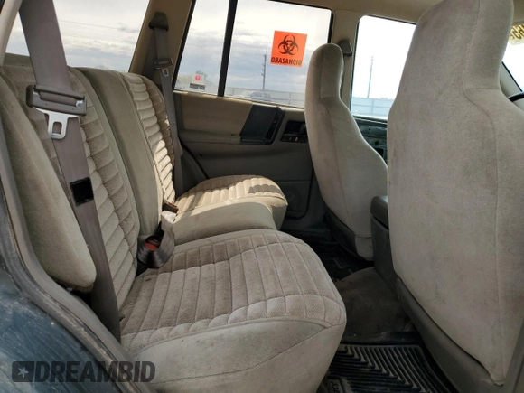 1993 Jeep Grand Cherokee Laredo with VIN 1J4GZ58Y8PC513026, listed as a Copart auction lot 57001465 with 135,242 mi miles and Clean title. Bid and sale history available at DreamBid. Image 11.