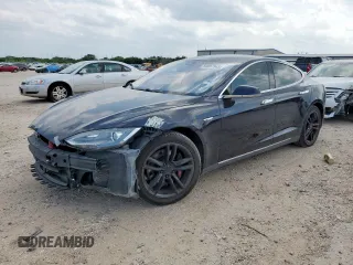 2014 Tesla Model S 60 z VIN 5YJSA1H10EFP62231, wystawiony jako Copart lot #59607945 z przebiegiem 113 352 mil mil oraz Szkoda całkowita • Salvage title. Historia ofert i sprzedaży dostępna na DreamBid. Obrazek 1.