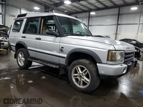 2003 Land Rover Discovery with VIN SALTY16493A801832, listed as a Copart auction lot 58690064 with 125,569 mi miles and Salvage Title. Bid and sale history available at DreamBid. Image 4.