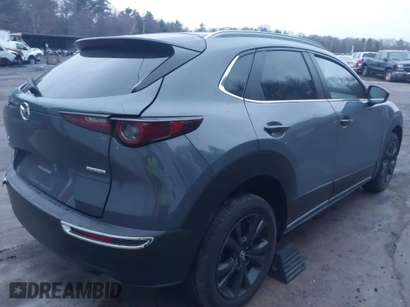 2023 Mazda CX-30 S Carbon Edition with VIN 3MVDMBCM5PM545150, listed as a IAAI auction lot 41104881 with 30,459 mi miles and . Bid and sale history available at DreamBid. Image 4.