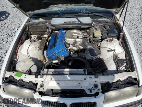 1995 BMW 3 Series 318i z VIN WBABK6322SED17173, wystawiony jako Copart lot #53887285 z przebiegiem Nie podano mil oraz Nie do naprawy • Non repairable. Historia ofert i sprzedaży dostępna na DreamBid. Obrazek 11.