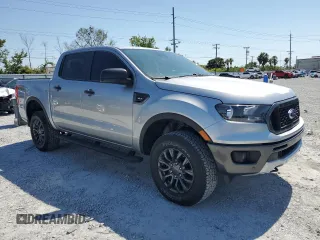2023 Ford Ranger XL with VIN 1FTER4FH3PLE03480, listed as a Copart auction lot 57113605 with 32,540 mi miles and Salvage title. Bid and sale history available at DreamBid. Image 4.