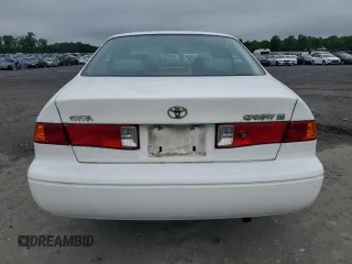 2000 Toyota Camry CE z VIN JT2BG28KXY0432024, wystawiony jako Copart lot #57057905 z przebiegiem 201 289 mil mil oraz Szkoda całkowita • Salvage title. Historia ofert i sprzedaży dostępna na DreamBid. Obrazek 6.