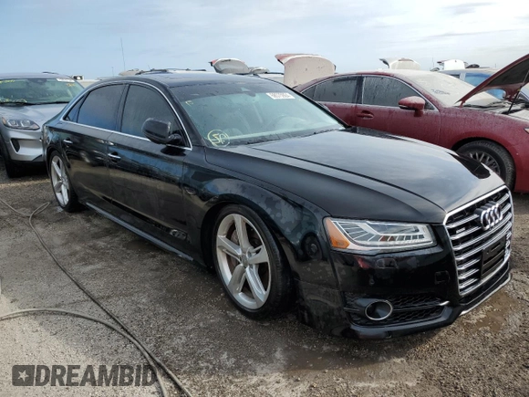 2018 Audi A8 z VIN WAU44AFD0JN000782, wystawiony jako Copart lot #68575924 z przebiegiem 99 098 mil mil oraz Nie do naprawy • Non repairable. Historia ofert i sprzedaży dostępna na DreamBid. Obrazek 4.