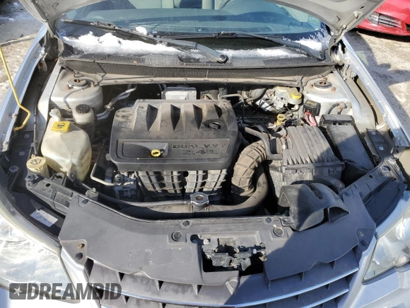 2007 Chrysler Sebring Touring z VIN 1C3LC56K07N669607, wystawiony jako Copart lot #87443504 z przebiegiem 204 179 mil mil oraz Szkoda całkowita • Salvage title. Historia ofert i sprzedaży dostępna na DreamBid. Obrazek 12.