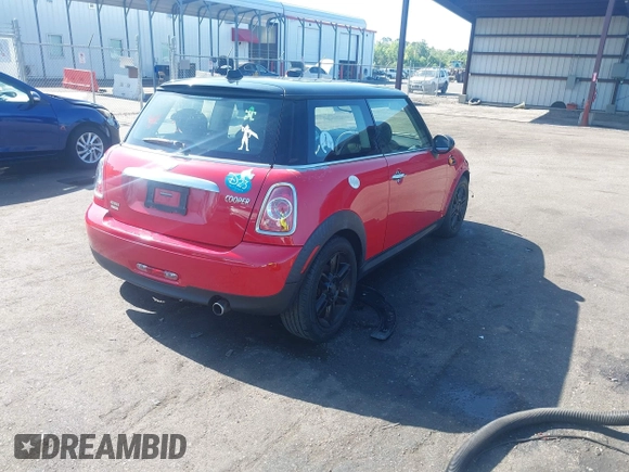 2013 MINI Hardtop with VIN WMWSU3C58DT683041, listed as a IAAI auction lot 42162366 with 76,724 mi miles and . Bid and sale history available at DreamBid. Image 4.