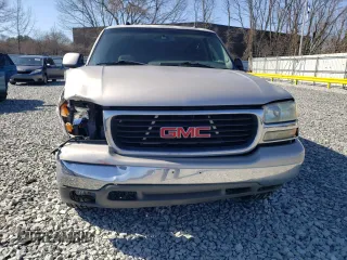 2004 GMC Yukon SLT z VIN 1GKEC13T64R286726, wystawiony jako Copart lot #52852365 z przebiegiem 243 292 mil mil oraz Czysty tytuł • Clean title. Historia ofert i sprzedaży dostępna na DreamBid. Obrazek 5.