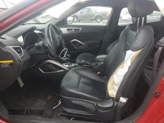 2014 Hyundai Veloster RE:FLEX z VIN KMHTC6AD3EU212525, wystawiony jako Copart lot #52935475 z przebiegiem 54 086 mil mil oraz Szkoda całkowita • Salvage title. Historia ofert i sprzedaży dostępna na DreamBid. Obrazek 7.