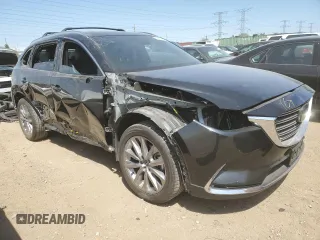 2021 Mazda CX-9 Grand Touring z VIN JM3TCBDY3M0527222, wystawiony jako Copart lot #54887005 z przebiegiem 35 674 mil mil oraz Szkoda całkowita • Salvage title. Historia ofert i sprzedaży dostępna na DreamBid. Obrazek 4.