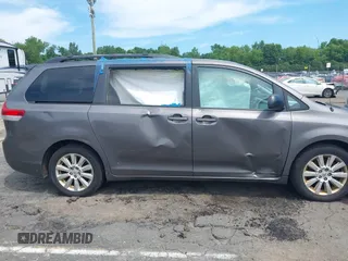2011 Toyota Sienna XLE with VIN 5TDDK3DC8BS028176, listed as a IAAI auction lot 42592654 with 161,992 mi miles and . Bid and sale history available at DreamBid. Image 13.