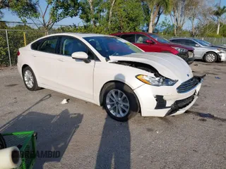2020 Ford Fusion Hybrid SE with VIN 3FA6P0LU6LR184925, listed as a IAAI auction lot 41328622 with 40,412 mi miles. Bid and sale history available at carsss.com. Image 1.
