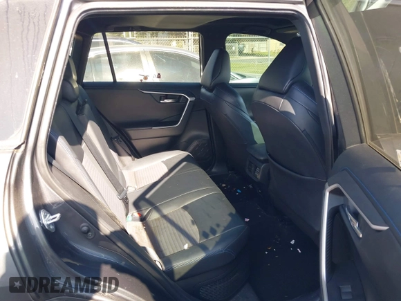 2021 Toyota RAV4 Hybrid XSE z VIN 2T3E6RFV8MW006805, wystawiony jako IAAI lot #41973250 z przebiegiem 77 483 mil mil oraz . Historia ofert i sprzedaży dostępna na DreamBid. Obrazek 8.