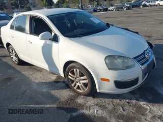2007 Volkswagen Jetta with VIN 3VWGG71K47M076277, listed as a IAAI auction lot 41356422 with 176,821 mi miles and . Bid and sale history available at DreamBid. Image 1.
