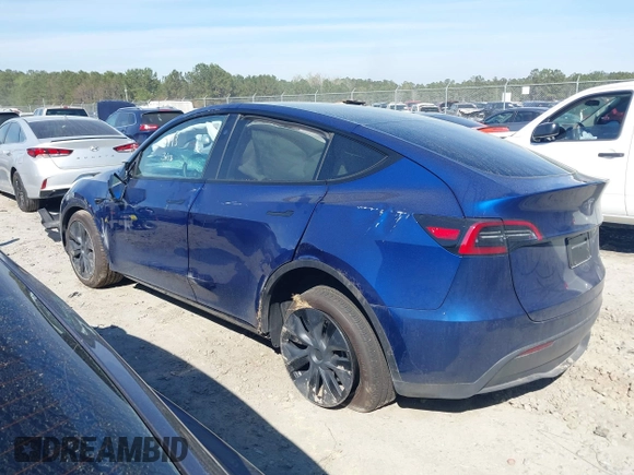 2025 Tesla Model Y Long Range with VIN 7SAYGDEEXSA346006, listed as a IAAI auction lot 41835610 with 1,896 mi miles and . Bid and sale history available at carsss.com. Image 14.